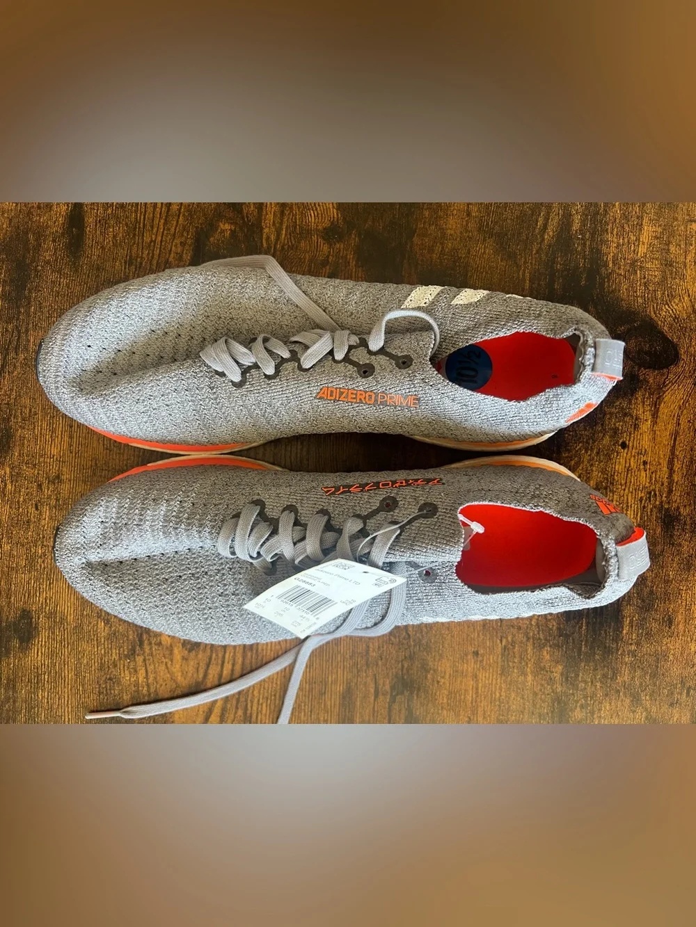 adidas Adizero Prime Light Gray Running Shoes with Orange Accents